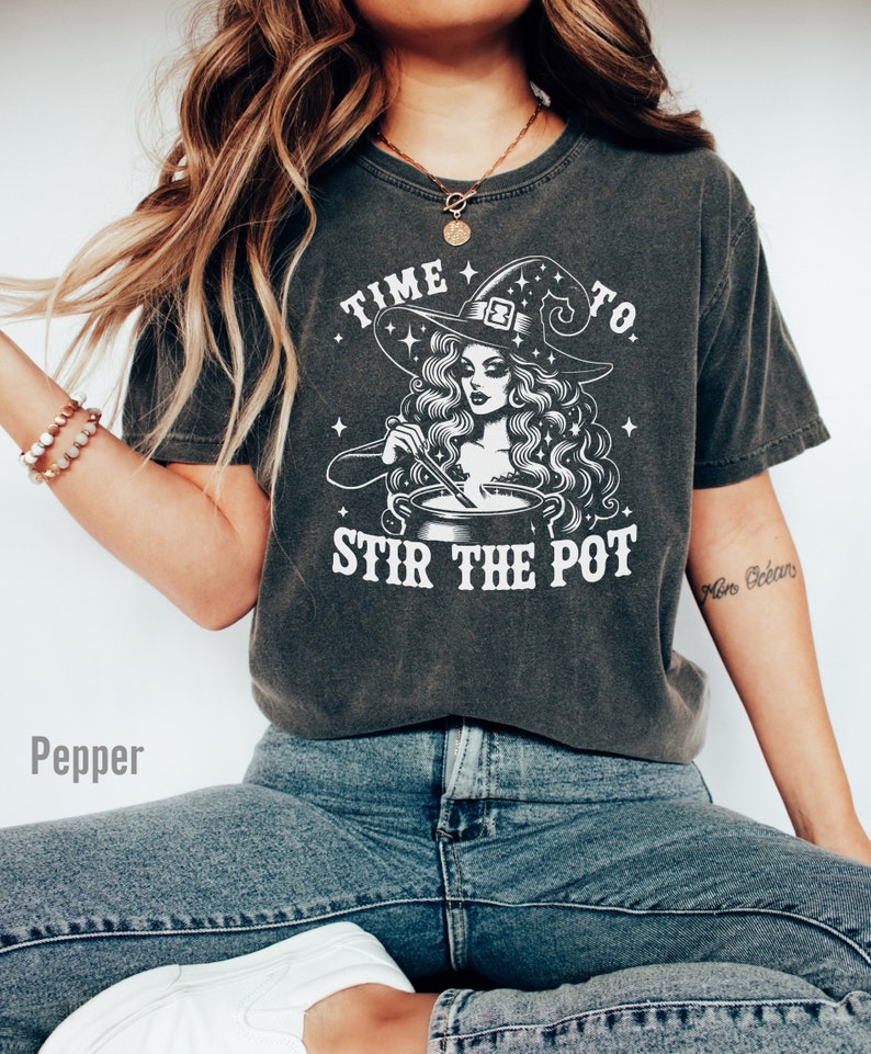 Halloween pun shirt with diva witch stirring a pot with the words time to stir the pot