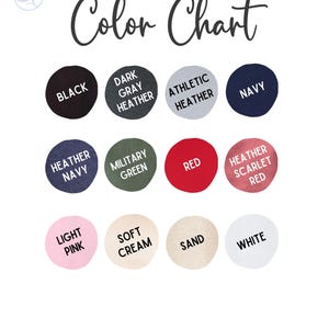 May include: Color chart showing 12 different t-shirt colors: black, dark gray heather, athletic heather, navy, heather navy, military green, red, heather scarlet red, light pink, soft cream, sand, and white.