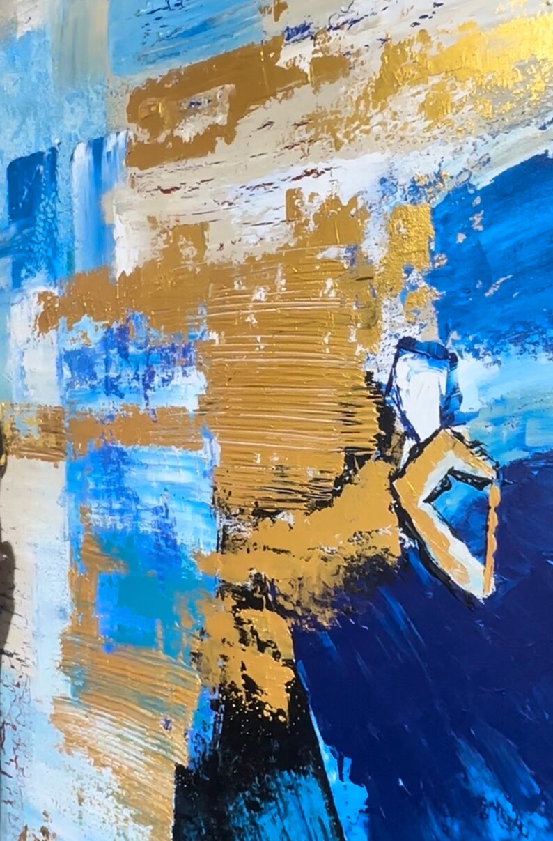 May include: Abstract painting with blue, gold, and white paint strokes. The painting has a textured surface and a modern style.