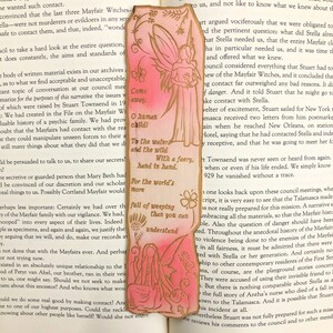 May include: A pink and gold bookmark with a fairy illustration and the text "Come away, O human child. To the waters and the wild with a faery, hand in hand. For the world's more full of weeping than you can understand."