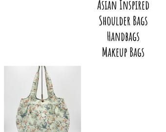 Elegant Asian-Inspired Handbags with Traditional Motifs and Exquisite Craftsmanship