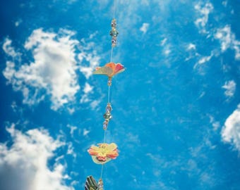 Handcrafted Dark Teal Iridescent Hummingbird Suncatcher with Glass Beads and Flower Accents - USA Made Artisan Window Decor for Nature Lover