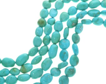 May include: A strand of turquoise beads, featuring a smooth, oval shape. The beads are a vibrant blue-green color and have a natural, polished finish.