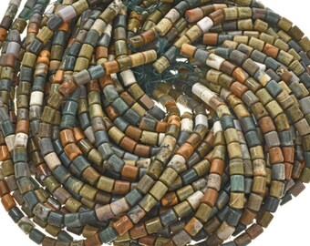 May include: A strand of multi-colored gemstone beads. The beads are cylindrical and have a mottled appearance with shades of green, brown, and white.