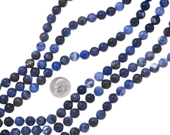 May include: A strand of blue and black gemstone beads. The beads are round and have a smooth, polished finish. The beads are strung on a clear thread and are approximately 8mm in diameter.