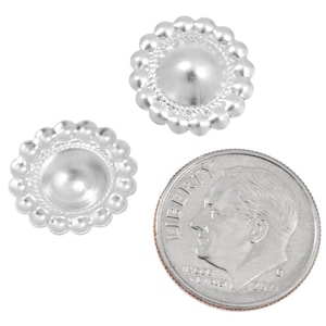 May include: Three silver-colored, round metal buttons with a raised center and a beaded edge. A U.S. dime is included for size comparison. The buttons have a shiny, reflective surface and are set against a white background.