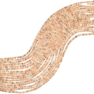 May include: A strand of light brown shell beads with a slightly iridescent sheen. The beads are cylindrical and have a smooth, polished finish.