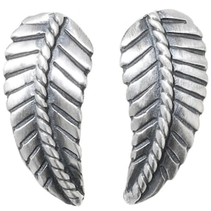 May include: A pair of silver earrings shaped like stylized leaves with a rope-like design down the center.