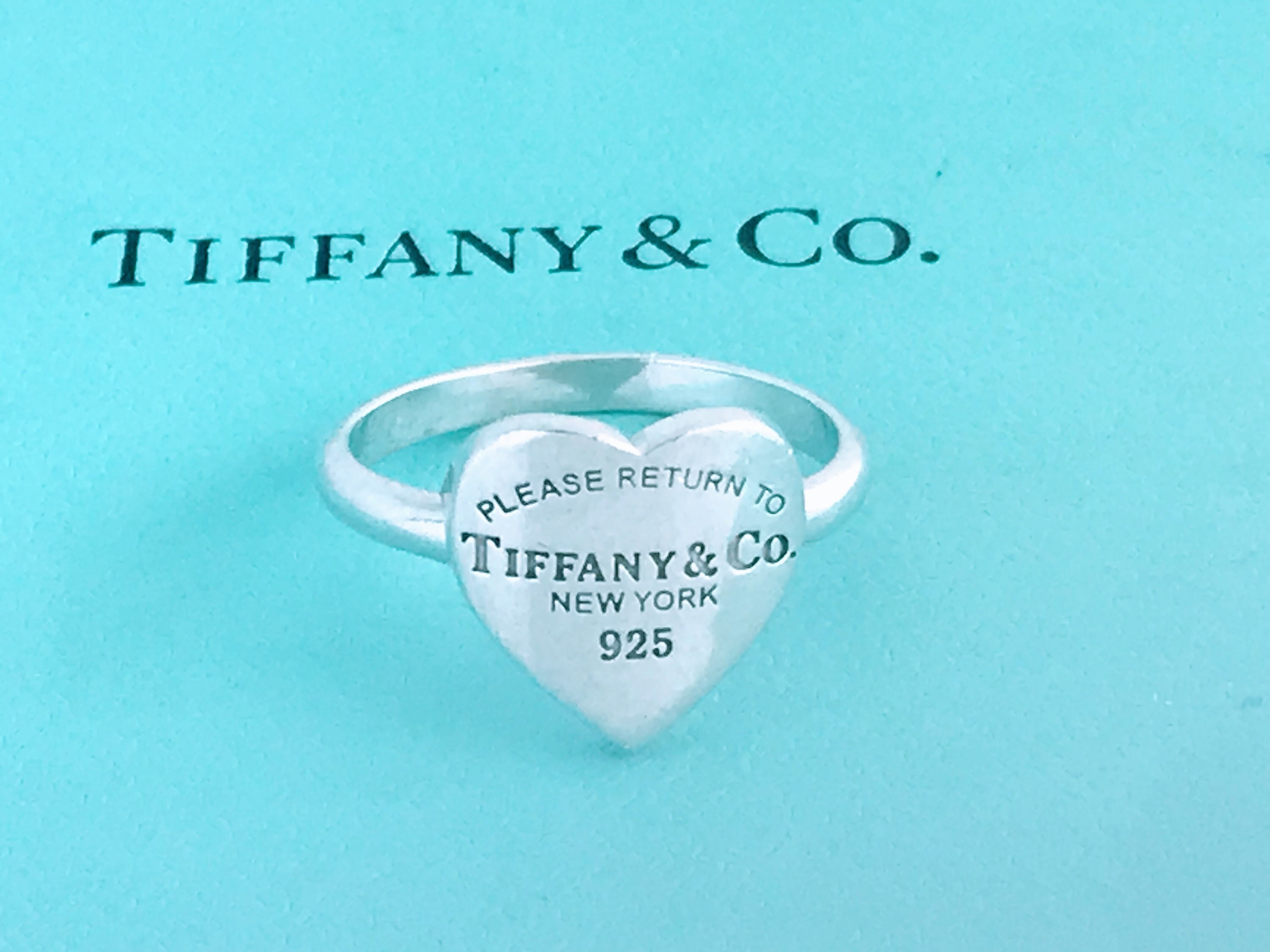Tiffany T diamond wire band ring in 18k white gold. | Tiffany & Co.