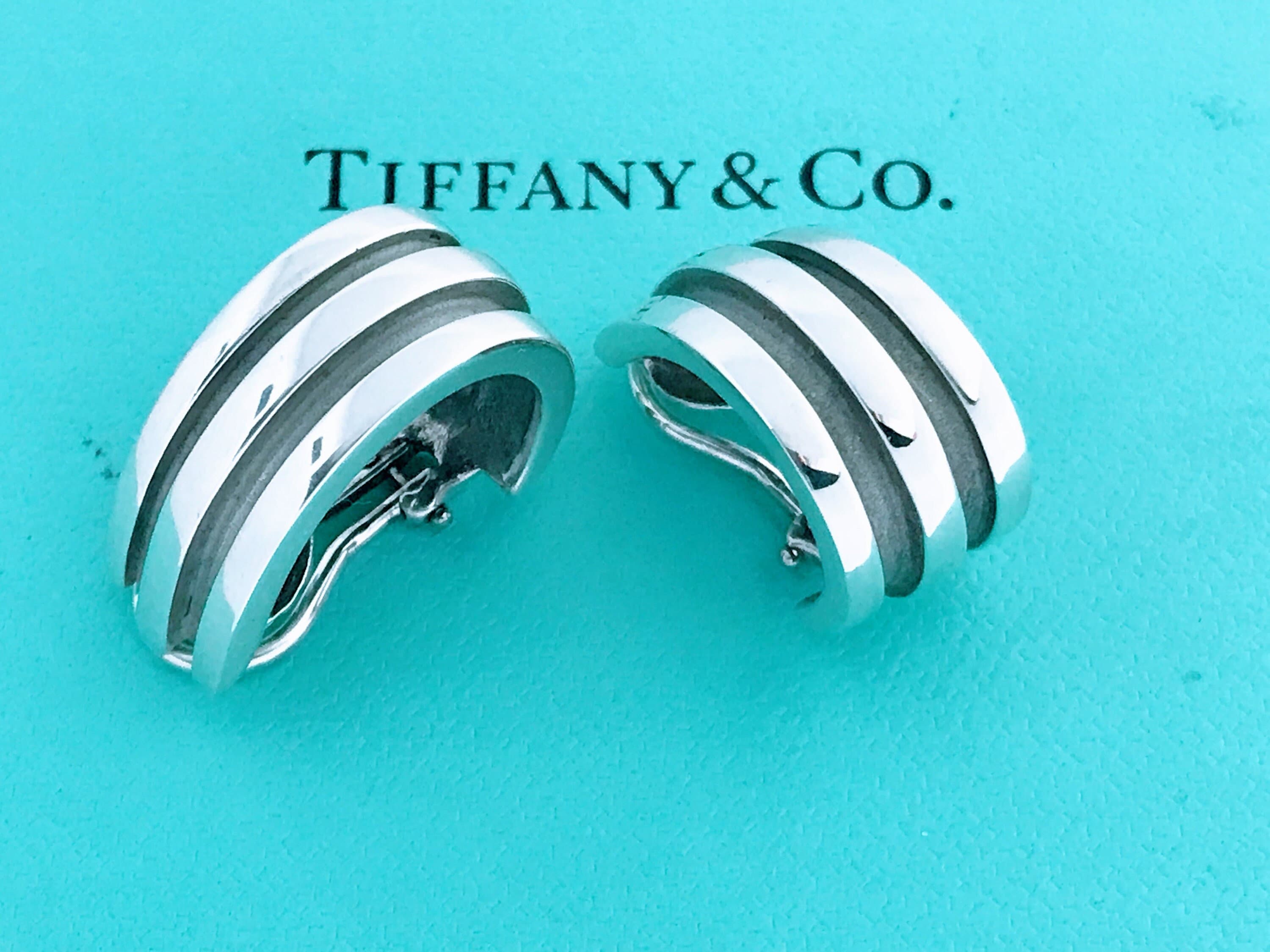 Elsa Peretti® Open Heart hoop earrings in sterling silver. More