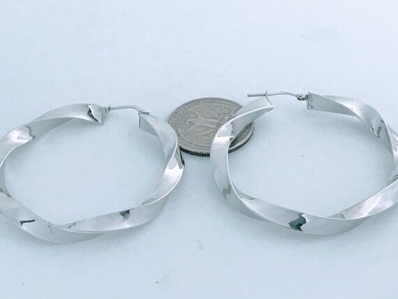 Spiral Twisted Silver Hoop Earrings | Oliver Bonas Spiral Twisted Silver Hoop Earrings | Oliver Bonas