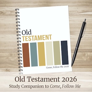 May include: A spiral-bound notebook with the words "Old Testament" in gold and a color palette. A black pen rests beside the notebook on a wooden surface. The text "Come, Follow Me 2026" is also visible.