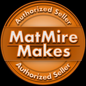 May include: A circular orange logo with the text "MatMire Makes" in white, outlined in orange. The words "Authorized Seller" are arched around the top and bottom of the circle in white. The background is black.