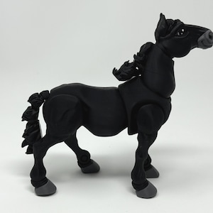 May include: A black articulated horse figurine with a detailed mane and tail. The horse has a sleek, modern design with gray hooves and joints. The figurine is posed in a standing position, showcasing its dynamic form.