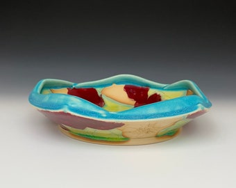 Low Serving/pasta bowl with undulating rim and dark red poppy pattern