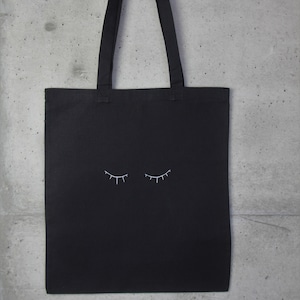 Fairtrade organic jute bag cotton bag black eyes sleeping
