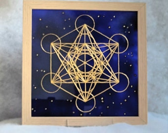 Cube de Metatron doré sur fond de galaxie tableau à poser pour laisser traverser la Lumière