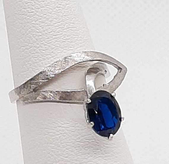 Ladies 10K White Gold Blue Topaz Ring - image 6