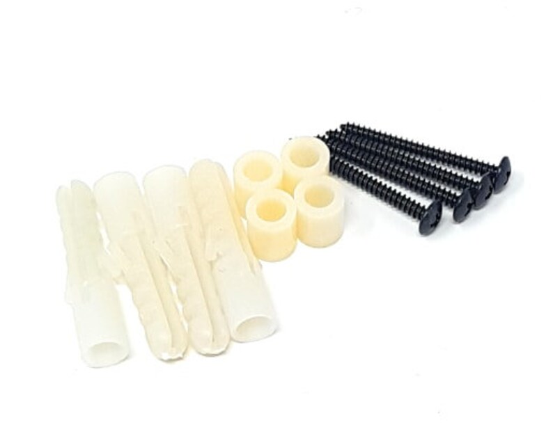 May include: A set of white plastic wall anchors and black screws for hanging items on a wall.