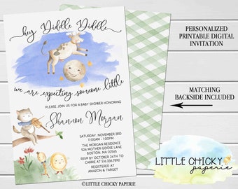 May include: A baby shower invitation featuring a watercolour illustration of a cow, cat, and a clock. The text reads "Hey Diddle Diddle, we are expecting someone little. Please join us for a baby shower honouring Shannon Morgan. Saturday, November 3rd, 11:00am - 1:00pm, The Morgan Residence, 526 Mother Goose Lane, Boston, MA 02565. RSVP by October 26th to Carrie at 516.336.7892. Registered at Amazon & Target. © Little Chickly Paperie."