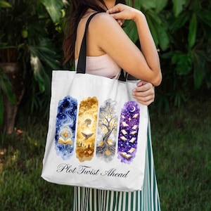 May include: White tote bag with black handles. The bag features four colourful vertical designs with a book theme, including celestial, tree, and landscape imagery. The words "Plot Twist Ahead" are printed at the bottom.