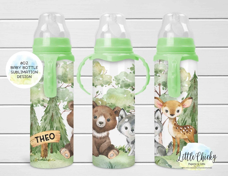 May include: Three 8 oz baby bottles with green handles and different woodland animal designs. The bottles are ready for sublimation. One bottle features a bear and wolf, another a deer, and the third a bear and the name "Theo" on a sign.