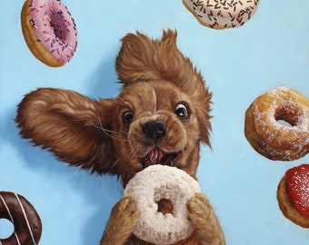 May include: A brown and white dog with floppy ears is looking up at the camera with its mouth open. The dog is holding a white donut in its paws. There are several other donuts in the background, including a pink donut with sprinkles, a white donut with sprinkles, a brown donut with powdered sugar, and a red donut with sprinkles.