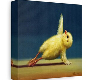May include: A yellow baby chick with its wings spread out is doing a yoga pose on a brown surface. The background is a dark blue.