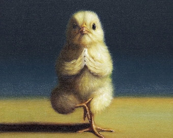 May include: A yellow chicklet stands on one leg in a yoga pose with its wings folded in front of its chest. The chicklet is on a light brown surface with a dark blue background.