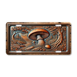 A metal license plate featuring a carved image of a large mushroom in a forest setting. The mushroom is brown and white with a red cap. The background is a forest scene with trees and a stream.