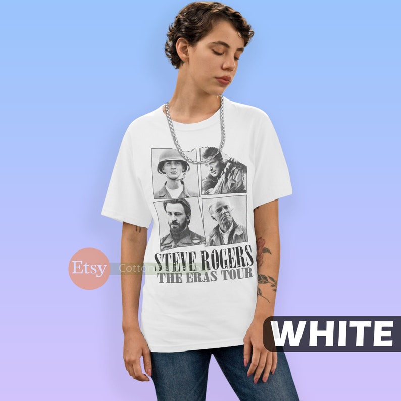 May include: White t-shirt with a black and white image of four different versions of Steve Rogers from the Marvel Cinematic Universe. The text "Steve Rogers The Eras Tour" is printed below the images.