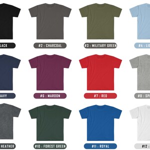 May include: A collection of twelve solid-color t-shirts, each displayed with a corresponding color name and number. Colors include black, charcoal, military green, light blue, navy, maroon, red, sport grey, dark heather, forest green, royal, and white.