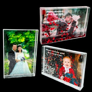May include: Three clear photo frames with glitter and text. The first frame has red hearts and the text "You are my today and all of tomorrow I can tell". The second frame has a couple in front of a green background. The third frame has a baby in front of a Christmas tree with the text "Best Dad Ever".