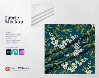 May include: A mockup of fabric with a white background and a teal floral pattern. The pattern features white flowers and green leaves. The text "Fabric Mockup" is at the top of the image. The text "Jami Watkins Graphic Design/Illustration" is at the bottom of the image.