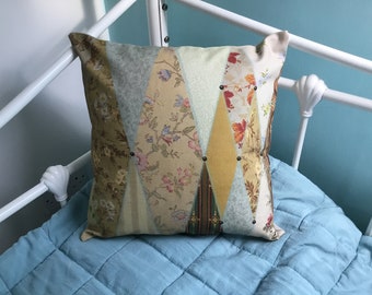 Cushion cover made from Angel Strawbridge’s Escape to the Chateau wallpaper museum fabric