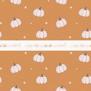 May include: A seamless pattern featuring white pumpkins on a brown background with white stars. The text "everything but the confetti" is repeated across the pattern.