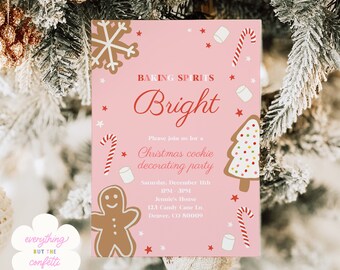May include: Pink Christmas cookie decorating party invitation with a gingerbread man, candy canes, and a Christmas tree. The text reads "Baking Spirits Bright" and includes the date, time, and location of the party.