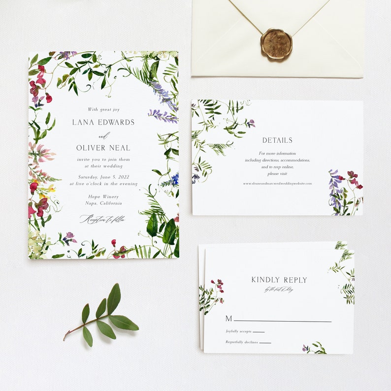May include: Wedding invitation suite with floral designs. The main invitation features a watercolour illustration of a floral border with the text "With great joy Lana Edwards and Oliver Neal invite you to join them at their wedding Saturday, June 5, 2022 at five o'clock in the evening Hope Winery Napa, California  Rugsten to Alla". The details card features the text "DETAILS For more information including directions, accommodations and to RSVP online please visit www.lanaandoliverwedding.com". The RSVP card features the text "KINDLY REPLY by [date] M Joyfully accepts Regretfully declines".