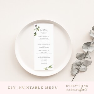 May include: Printable wedding menu card featuring a green and purple floral design. The menu includes the following courses: First Course, Field Greens Salad; Second Course, Rouille; Main Course, Filet of Beef or Wild Caught Salmon; Dessert, Wedding Cake. The text "DIY, Printable Menu" and "Everything but the confetti" are at the bottom of the card.