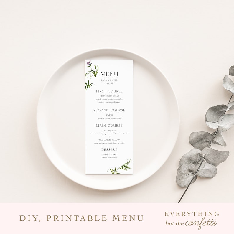 May include: Printable wedding menu card featuring a green and purple floral design. The menu includes the following courses: First Course, Field Greens Salad; Second Course, Rouille; Main Course, Filet of Beef or Wild Caught Salmon; Dessert, Wedding Cake. The text "DIY, Printable Menu" and "Everything but the confetti" are at the bottom of the card.