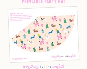 May include: Printable party hat template featuring a pink background with a repeating pattern of dogs wearing party hats and holding balloons. The text "PRINTABLE PARTY HAT" is at the top of the page and the text "everything BUT THE confetti" is at the bottom of the page.