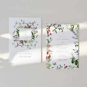 May include: Wedding invitation with a floral border. The invitation is white with green, purple, and pink flowers. The text reads "June 5, Lana and Oliver, 2022, Hope Winery, Napa, California, and RSVP to follow".