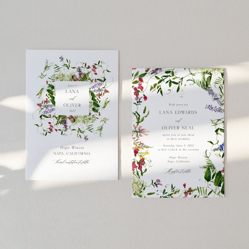 May include: Wedding invitation with a floral border. The invitation is white with green, purple, and pink flowers. The text reads "June 5, Lana and Oliver, 2022, Hope Winery, Napa, California, and RSVP to follow".