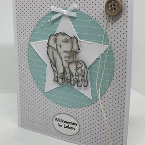 Babykarte zur Geburt mit einer kleinen Box zum Zusammenklappen