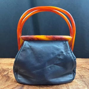 Bolso de mano vintage Margolin de piel de baquelita con asa de carey