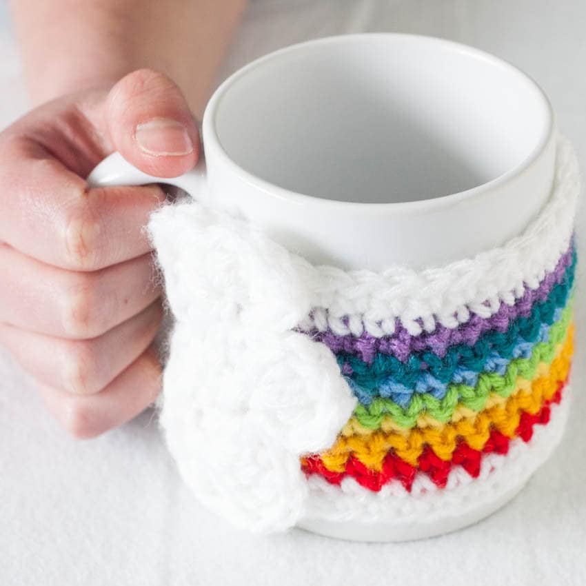 40 Rainbow Crochet Patterns to Brighten Home Decor, Gifts, and Everyday Accessories 12 Rainbow Mug Cozy Crochet Pattern with Cloud Applique