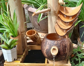 Solar power fountain from coconut and bamboo,handmake fountain with Solar pump, real handmake with solar energy and natural products