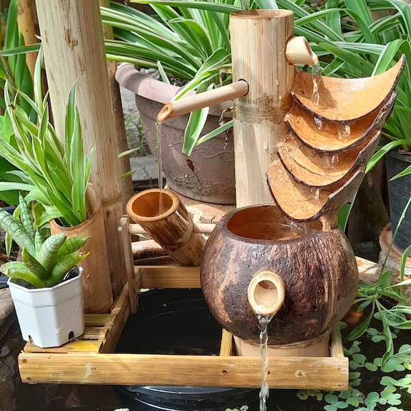 Solar power fountain from coconut and bamboo,handmake fountain with Solar pump, real handmake with solar energy and natural products
