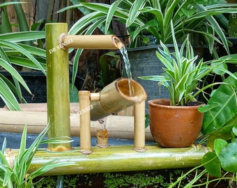Fontaine d'eau Odoshi dans une vasque intérieure ou extérieure, fontaine faite main en bambou véritable.
