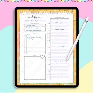 May include: A digital daily planner displayed on a tablet. The planner includes sections for priorities, a schedule, and notes. A white stylus rests on the screen. The text "THE daily PLAN" is visible at the top.